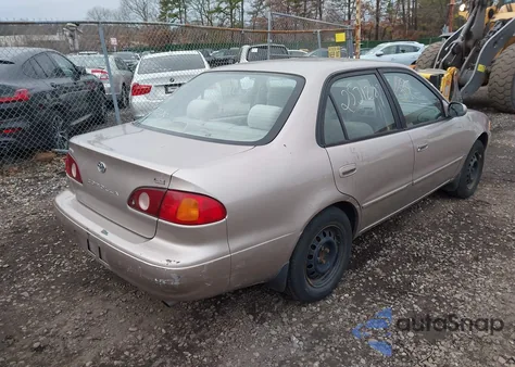 2002 Toyota Corolla Le из США, поврежденный, VIN 2T1BR12E22C575903